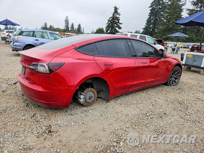 Trzecie zdjęcie samochodu z tyłu: 2022 TESLA MODEL 3 VIN:5YJ3E1EA0NF186220 - miniatura