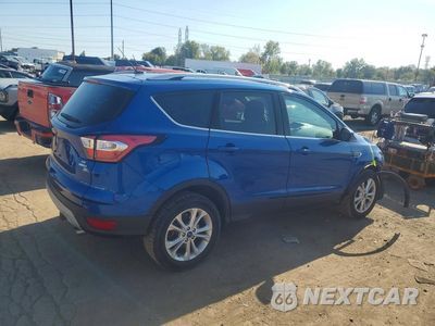Trzecie zdjęcie samochodu z tyłu: 2017 FORD ESCAPE SE VIN:1FMCU9GD1HUC76878 - miniatura