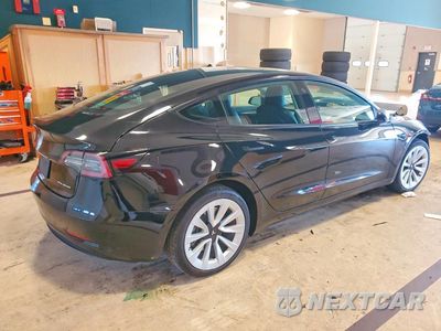 Trzecie zdjęcie samochodu z tyłu: 2022 TESLA MODEL 3 VIN:5YJ3E1EB6NF129884 - miniatura