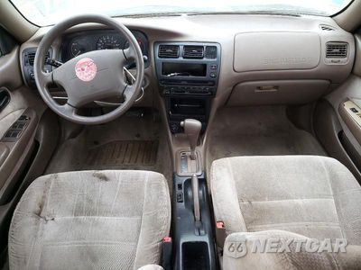 Zdjęcie 8 z 12 samochodu: 1996 TOYOTA COROLLA DX VIN:1NXBB02E8TZ405723 - miniatura