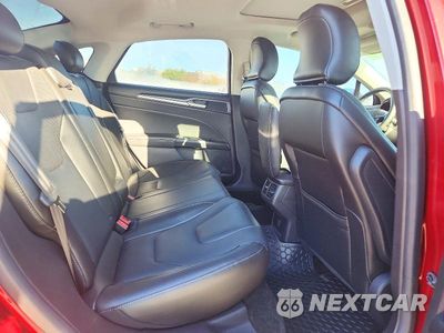 Zdjęcie 10 z 12 samochodu: 2016 FORD FUSION TITANIUM VIN:3FA6P0K98GR240365 - miniatura