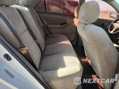Zdjęcie 10 z 13 samochodu: 2003 TOYOTA COROLLA LE VIN:JTDBR38E030022391 - miniatura