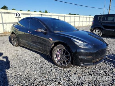 Czwarte zdjęcie samochodu z boku: 2019 TESLA MODEL 3 VIN:5YJ3E1EA8KF400043 - miniatura