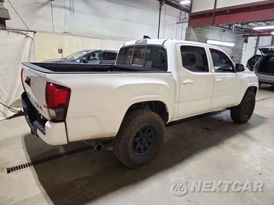 Trzecie zdjęcie samochodu z tyłu: 2023 TOYOTA TACOMA SR V6 VIN:3TYCZ5AN1PT123540 - miniatura