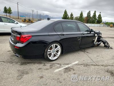 Trzecie zdjęcie samochodu z tyłu: 2014 BMW 750 LI VIN:WBAYE8C55ED134249 - miniatura