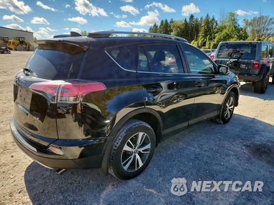 Trzecie zdjęcie samochodu z tyłu: 2018 TOYOTA RAV4 XLE VIN:2T3WFREV7JW438707 - miniatura