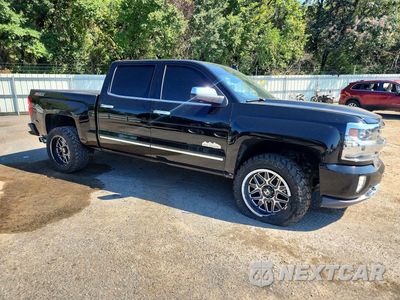 Czwarte zdjęcie samochodu z boku: 2018 CHEVROLET SILVERADO K1500 HIGH COUNTRY VIN:3GCUKTEJ8JG198273 - miniatura