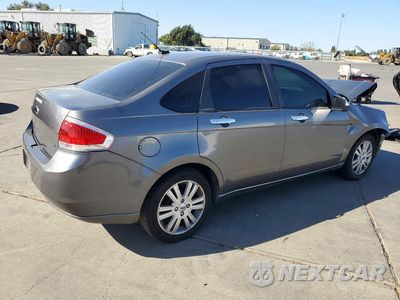 Trzecie zdjęcie samochodu z tyłu: 2010 FORD FOCUS SEL VIN:1FAHP3HN1AW235642 - miniatura