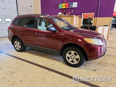 Czwarte zdjęcie samochodu z boku: 2009 HYUNDAI SANTA FE GLS VIN:5NMSG13D09H316066 - miniatura