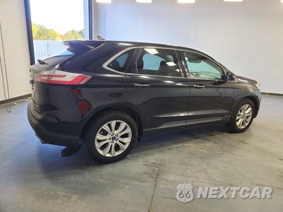 Trzecie zdjęcie samochodu z tyłu: 2022 FORD EDGE TITANIUM VIN:2FMPK4K96NBA55727 - miniatura
