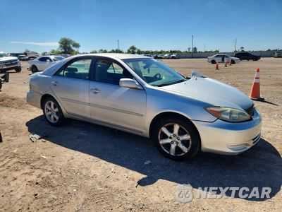 Czwarte zdjęcie samochodu z boku: 2002 TOYOTA CAMRY LE VIN:4T1BE32K22U054627 - miniatura