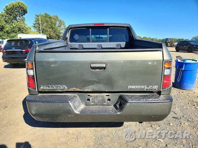 Zdjęcie 6 z 12 samochodu: 2006 HONDA RIDGELINE RTS VIN:2HJYK16426H543380 - miniatura