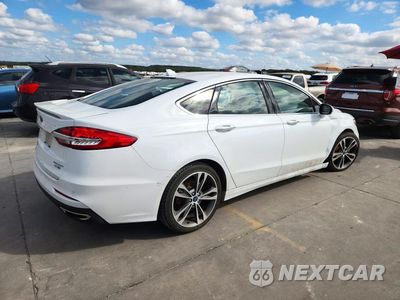 Trzecie zdjęcie samochodu z tyłu: 2020 FORD FUSION TITANIUM VIN:3FA6P0D94LR128153 - miniatura