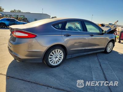 Trzecie zdjęcie samochodu z tyłu: 2014 FORD FUSION S HYBRID VIN:3FA6P0UU7ER276076 - miniatura