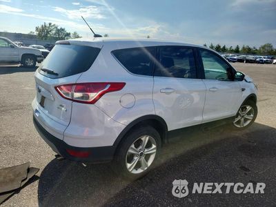 Trzecie zdjęcie samochodu z tyłu: 2014 FORD ESCAPE SE VIN:1FMCU0GX9EUE28214 - miniatura