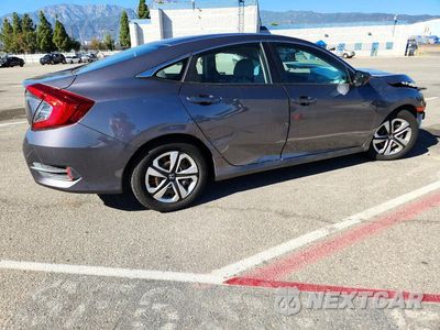 Trzecie zdjęcie samochodu z tyłu: 2018 HONDA CIVIC LX VIN:2HGFC2F54JH606030 - miniatura