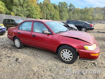 Czwarte zdjęcie samochodu z boku: 1997 TOYOTA COROLLA BASE VIN:1NXBA02E3VZ638981 - miniatura