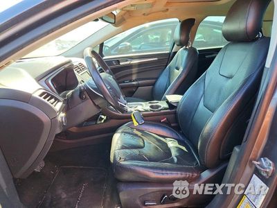 Zdjęcie 7 z 12 samochodu: 2013 FORD FUSION TITANIUM PHEV VIN:3FA6P0SU8DR260499 - miniatura
