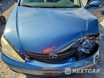 Zdjęcie 11 z 12 samochodu: 2004 TOYOTA CAMRY LE VIN:4T1BE32K34U927692 - miniatura