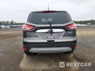 Zdjęcie 6 z 13 samochodu: 2014 FORD ESCAPE TITANIUM VIN:1FMCU9J98EUB56558 - miniatura