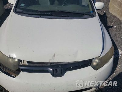 Zdjęcie 11 z 12 samochodu: 2007 HONDA CIVIC LX VIN:2HGFG12627H532130 - miniatura