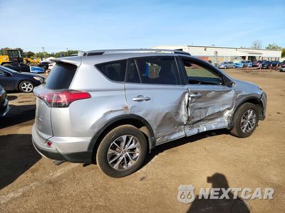 Trzecie zdjęcie samochodu z tyłu: 2018 TOYOTA RAV4 HYBRID XLE VIN:JTMRJREV2JD258205 - miniatura