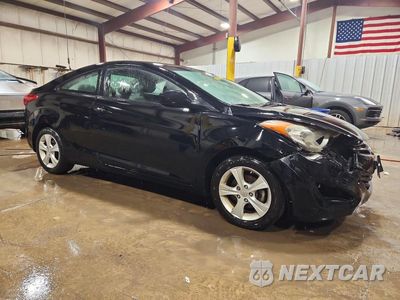 Czwarte zdjęcie samochodu z boku: 2013 HYUNDAI ELANTRA COUPE GS VIN:KMHDH6AE9DU002623 - miniatura