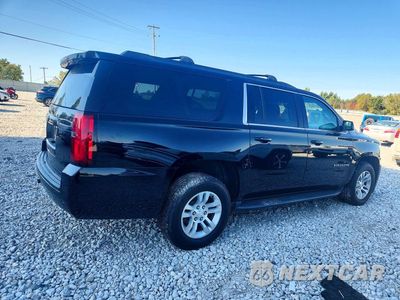 Trzecie zdjęcie samochodu z tyłu: 2016 CHEVROLET SUBURBAN K1500 LT VIN:1GNSKHKC3GR341933 - miniatura