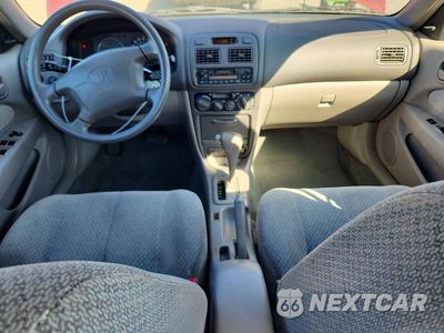 Zdjęcie 8 z 12 samochodu: 2000 TOYOTA COROLLA VIN:1NXBR12E3YZ367908 - miniatura