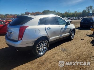 Trzecie zdjęcie samochodu z tyłu: 2014 CADILLAC SRX PREMIUM COLLECTION VIN:3GYFNGE30ES659925 - miniatura
