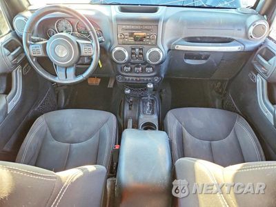 Zdjęcie 8 z 12 samochodu: 2016 JEEP WRANGLER UNLIMITED SAHARA VIN:1C4HJWEG2GL158857 - miniatura