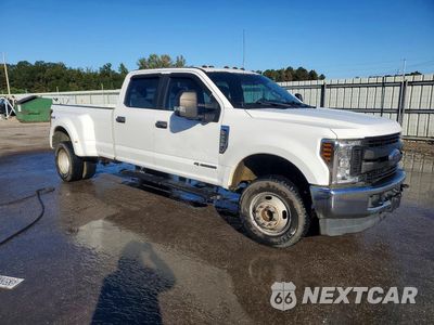 Czwarte zdjęcie samochodu z boku: 2019 FORD F350 SUPER DUTY VIN:1FT8W3DT4KEG50348 - miniatura