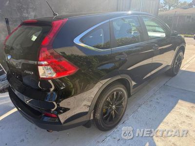 Czwarte zdjęcie samochodu z boku: 2015 HONDA CR-V LX VIN:2HKRM4H36FH600941 - miniatura
