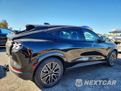 Trzecie zdjęcie samochodu z tyłu: 2025 FORD MUSTANG MACH-E PREMIUM VIN:3FMTK3R71SMA25414 - miniatura