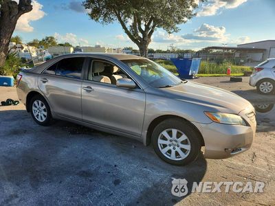 Czwarte zdjęcie samochodu z boku: 2009 TOYOTA CAMRY BASE VIN:4T1BE46K79U884661 - miniatura