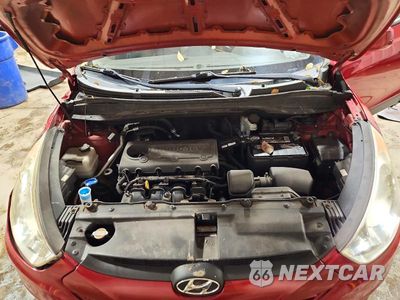 Zdjęcie 12 z 13 samochodu: 2010 HYUNDAI TUCSON GLS VIN:KM8JU3AC5AU073826 - miniatura