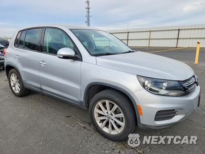 Czwarte zdjęcie samochodu z boku: 2014 VOLKSWAGEN TIGUAN S VIN:WVGAV3AX4EW585166 - miniatura