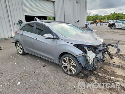 Czwarte zdjęcie samochodu z boku: 2013 HYUNDAI ELANTRA GT BASE VIN:KMHD35LE7DU092652 - miniatura