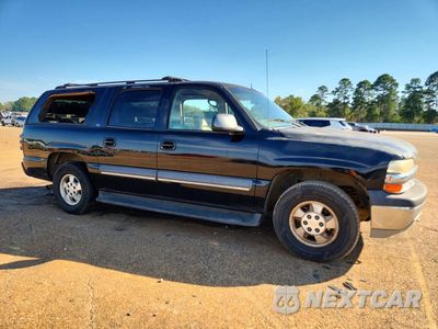 Czwarte zdjęcie samochodu z boku: 2002 CHEVROLET SUBURBAN C1500 VIN:3GNEC16Z32G344582 - miniatura
