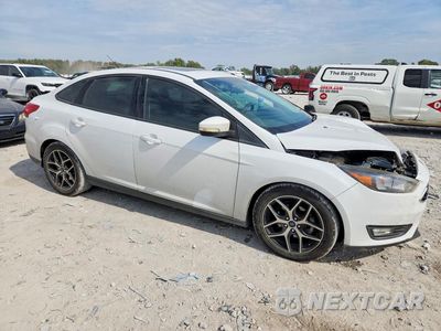 Czwarte zdjęcie samochodu z boku: 2018 FORD FOCUS SEL VIN:1FADP3H27JL223498 - miniatura