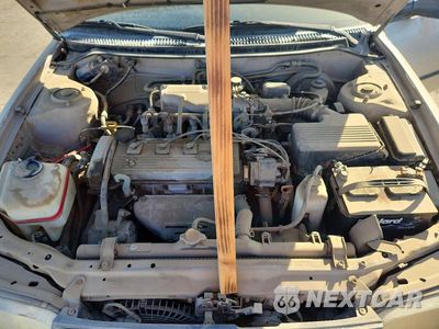 Zdjęcie 11 z 12 samochodu: 1995 TOYOTA COROLLA DX VIN:1NXAE09B2SZ329302 - miniatura