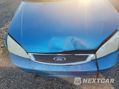 Zdjęcie 11 z 12 samochodu: 2007 FORD FOCUS ZX3 VIN:1FAHP31N77W282211 - miniatura