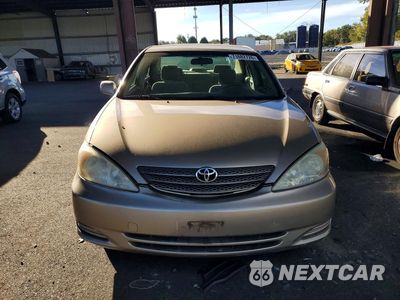 Piąte zdjęcie samochodu w środku: 2003 TOYOTA CAMRY LE VIN:JTDBE32K130143182 - miniatura