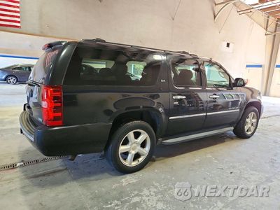 Trzecie zdjęcie samochodu z tyłu: 2012 CHEVROLET SUBURBAN K1500 LTZ VIN:1GNSKKE78CR276258 - miniatura