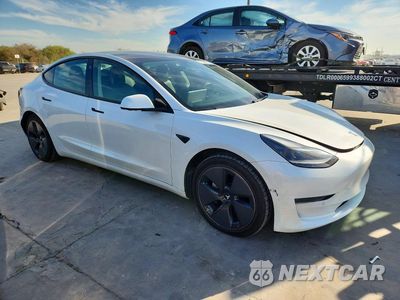 Czwarte zdjęcie samochodu z boku: 2021 TESLA MODEL 3 VIN:5YJ3E1EA6MF947833 - miniatura