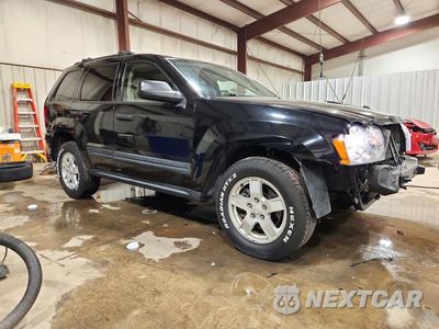 Czwarte zdjęcie samochodu z boku: 2005 JEEP GRAND CHEROKEE LAREDO VIN:1J4HR48N75C725224 - miniatura