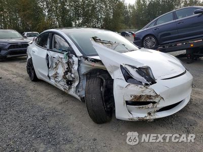 Czwarte zdjęcie samochodu z boku: 2023 TESLA MODEL 3 VIN:5YJ3E1EC5PF419142 - miniatura