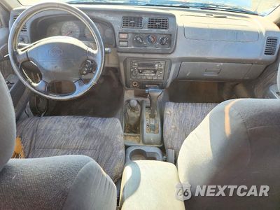 Zdjęcie 8 z 12 samochodu: 2000 NISSAN FRONTIER XE VIN:1N6ED27Y0YC309265 - miniatura