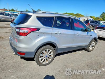 Trzecie zdjęcie samochodu z tyłu: 2017 FORD ESCAPE TITANIUM VIN:1FMCU9J98HUD90574 - miniatura