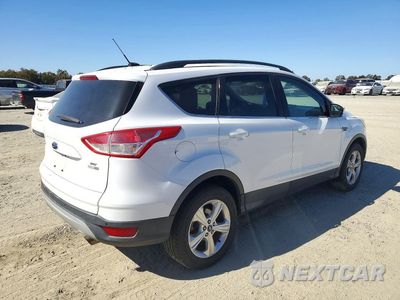 Trzecie zdjęcie samochodu z tyłu: 2016 FORD ESCAPE SE VIN:1FMCU9GX4GUC46637 - miniatura